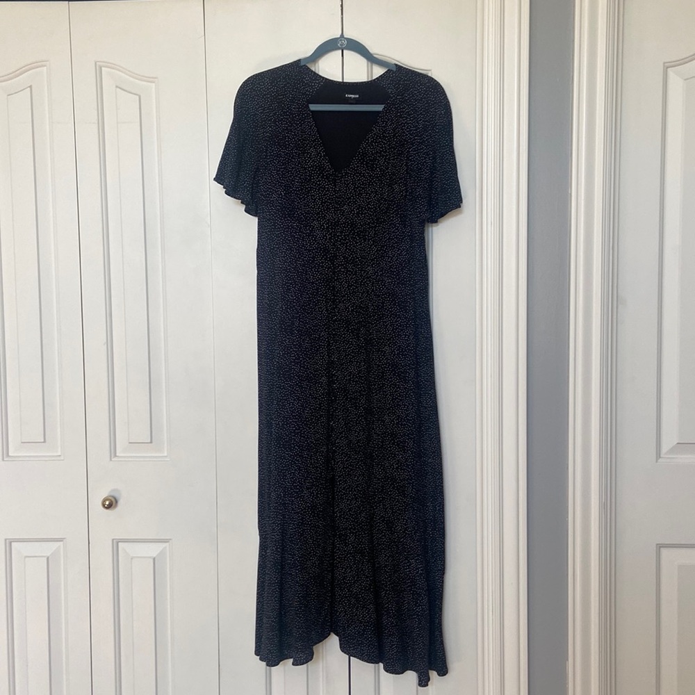 Sexy black dress, with middle slit and eyelet buttons